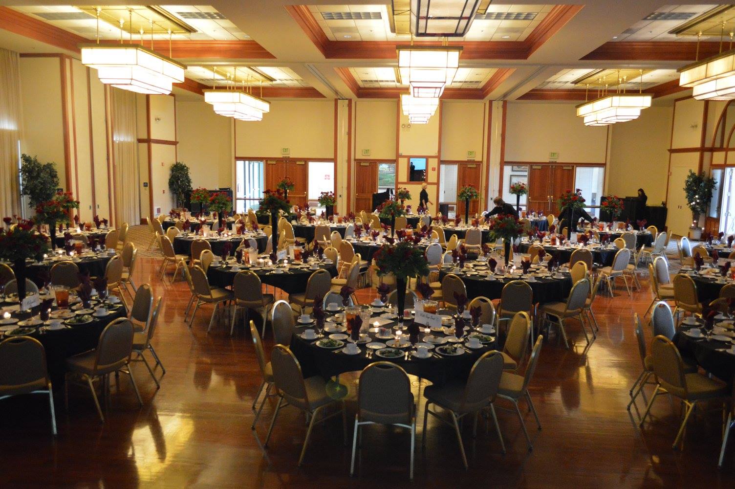 A Large Room With Tables And Chairs